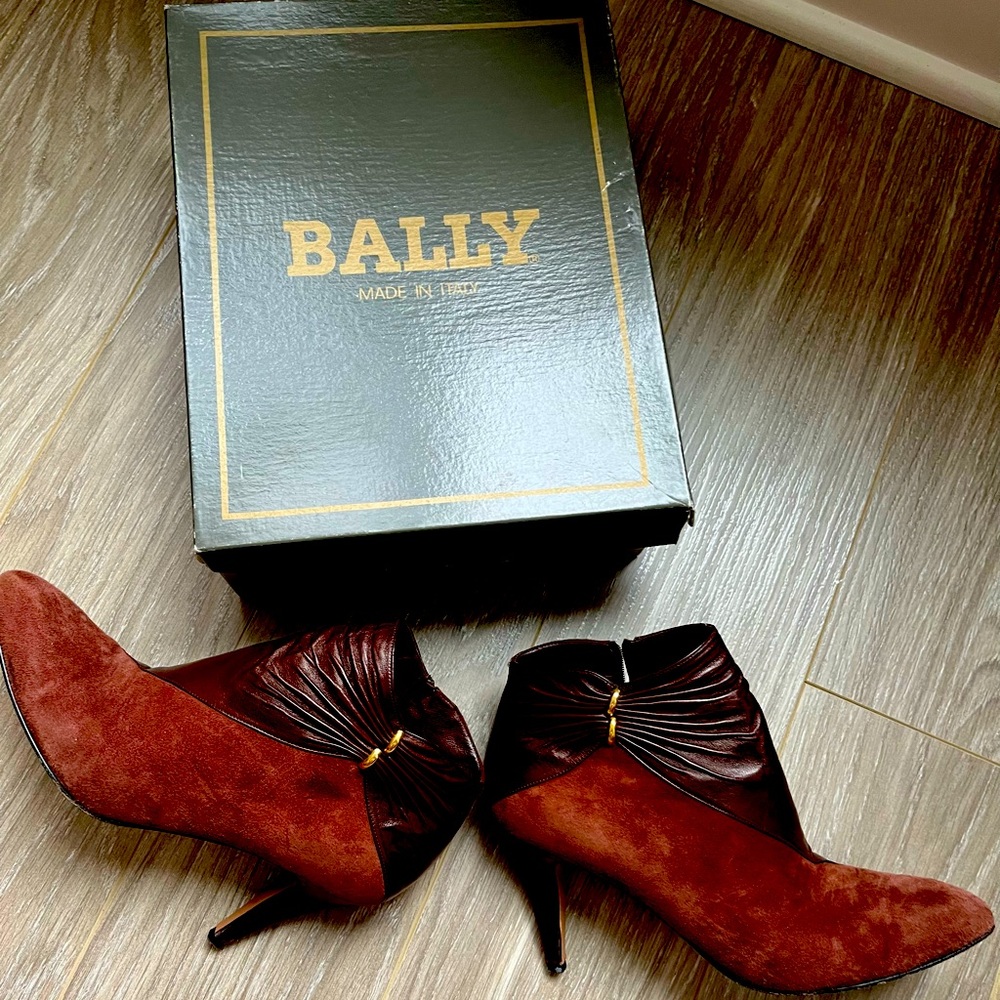 Rich brown leather and suede shoe boots with gold accents.